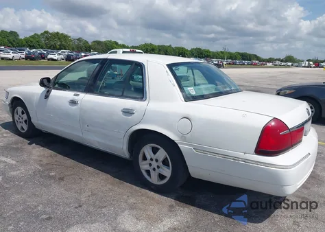 2002 Mercury Grand Marquis Gs из США, поврежденный, VIN 2MEFM74W92X649871